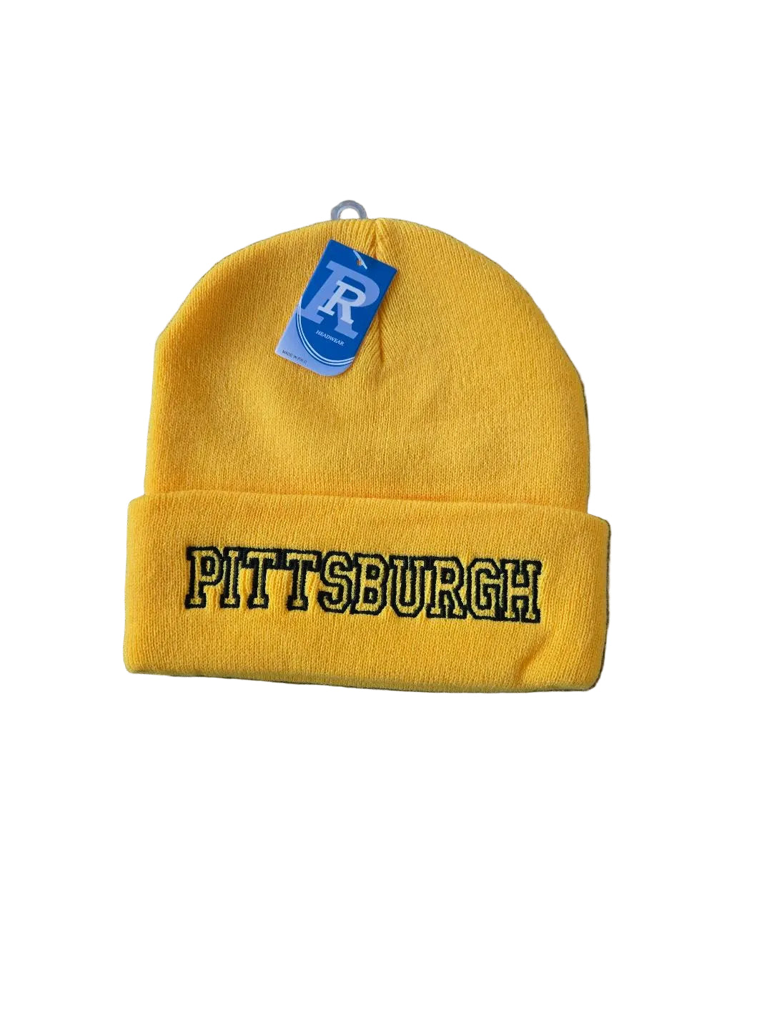 Yellow beanie with 'Pittsburgh' text on a gray surface
