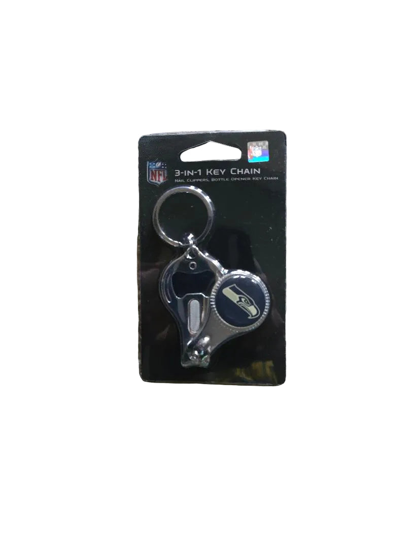 Keychain on a packaging card with NFL branding on a carpeted floor.