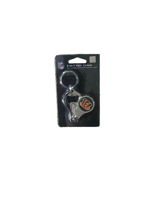 3-in-1 keychain on a black card with NFL logo on a gray carpet background

