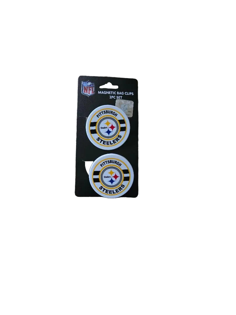 Pittsburgh Steelers magnetic bag clips on a gray carpet

