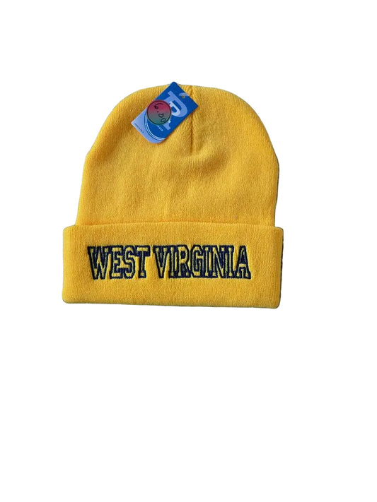 Yellow beanie with 'West Virginia' text on a gray surface

